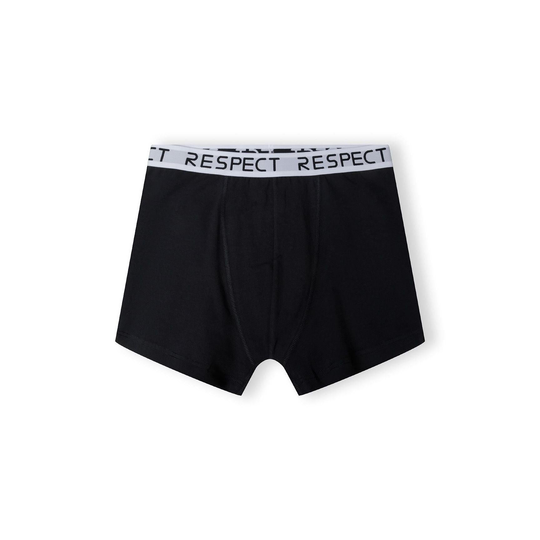 Single black boxer with white Respect logo waistband shown flat lay front view on white background