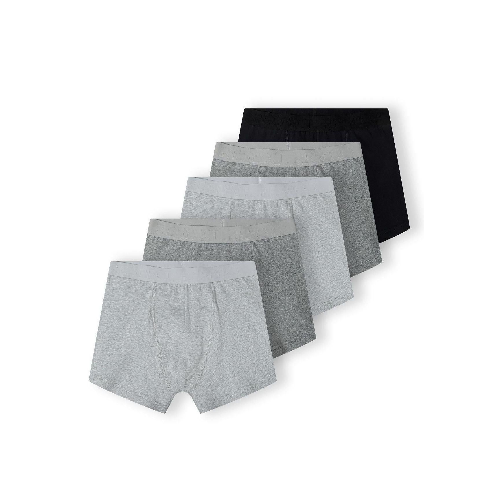 Five boxer shorts fanned out showing grey and black cotton styles with elastic waistbands on white background