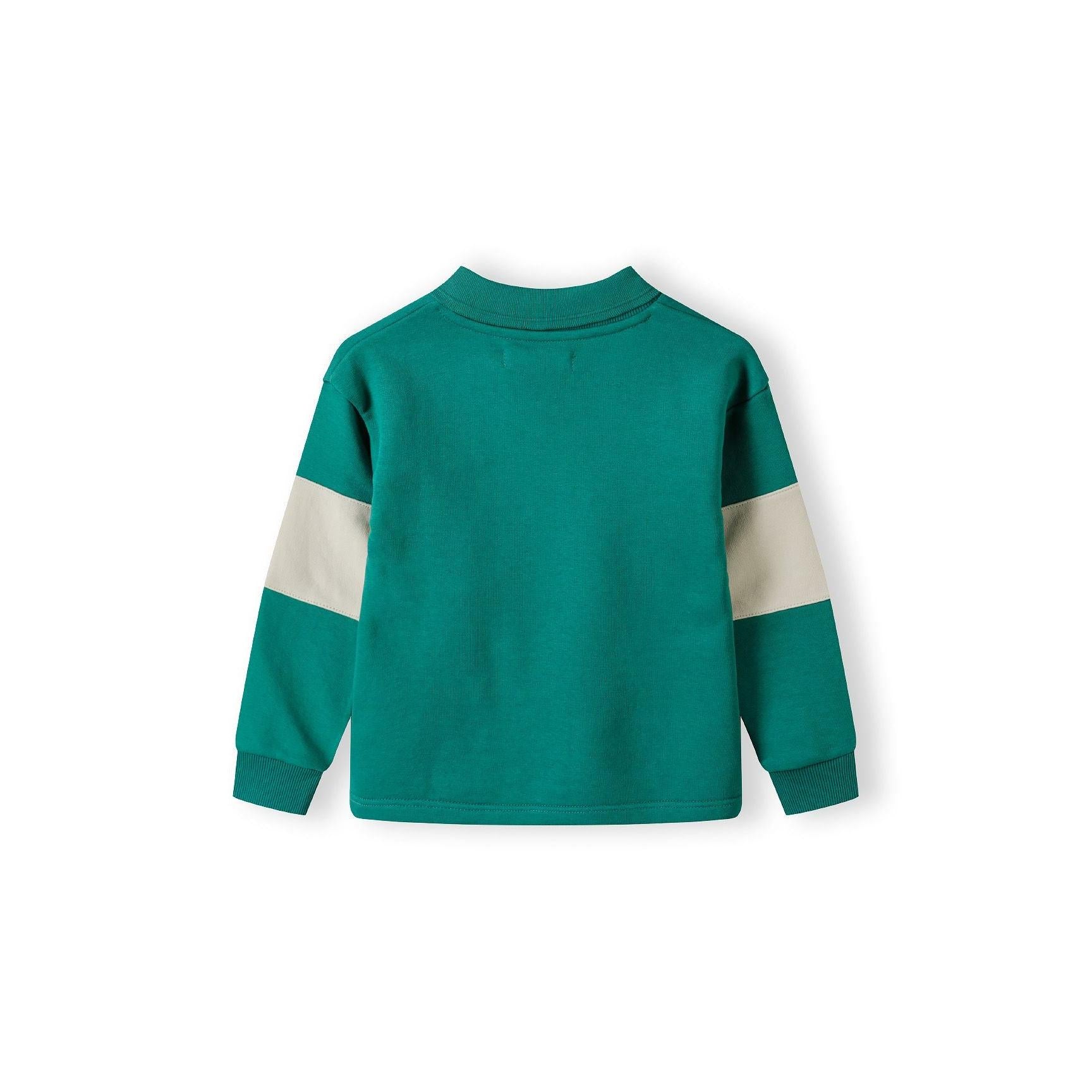 Back view of green fleece polo jumper showing contrast cream panel across sleeves and ribbed collar detail on white background
