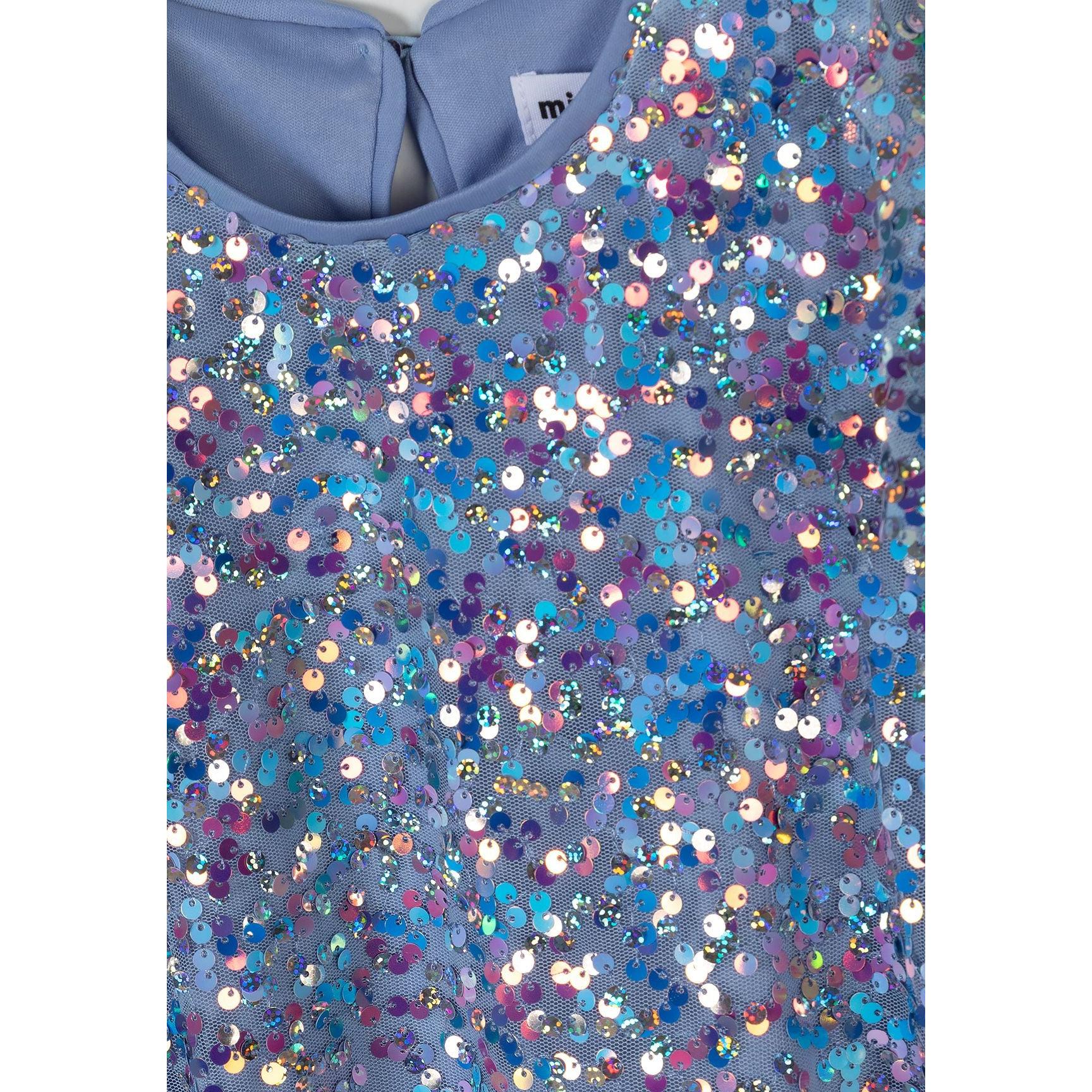 Close-up detail of multicolored sequin embellishment showing blue, purple, pink and silver sequins with Minoti label visible