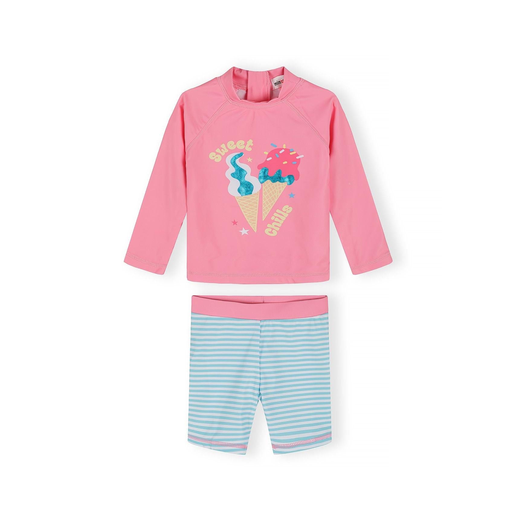 Pink and blue rash vest swim set laid flat showing long-sleeved top with ice cream graphics and matching striped shorts on white background