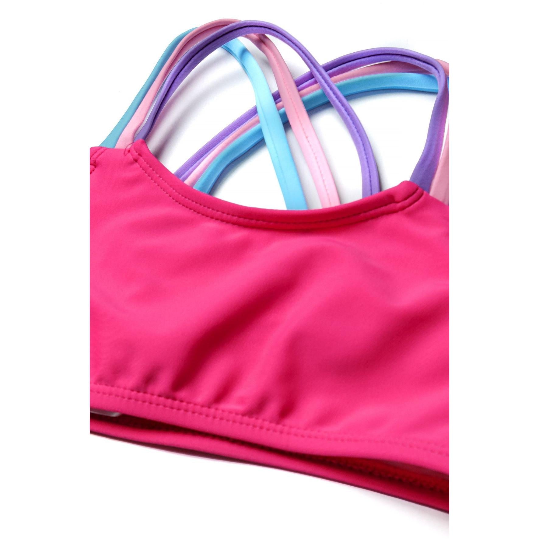 Close-up detail view of pink bikini top showing colourful purple, pink and blue straps arrangement