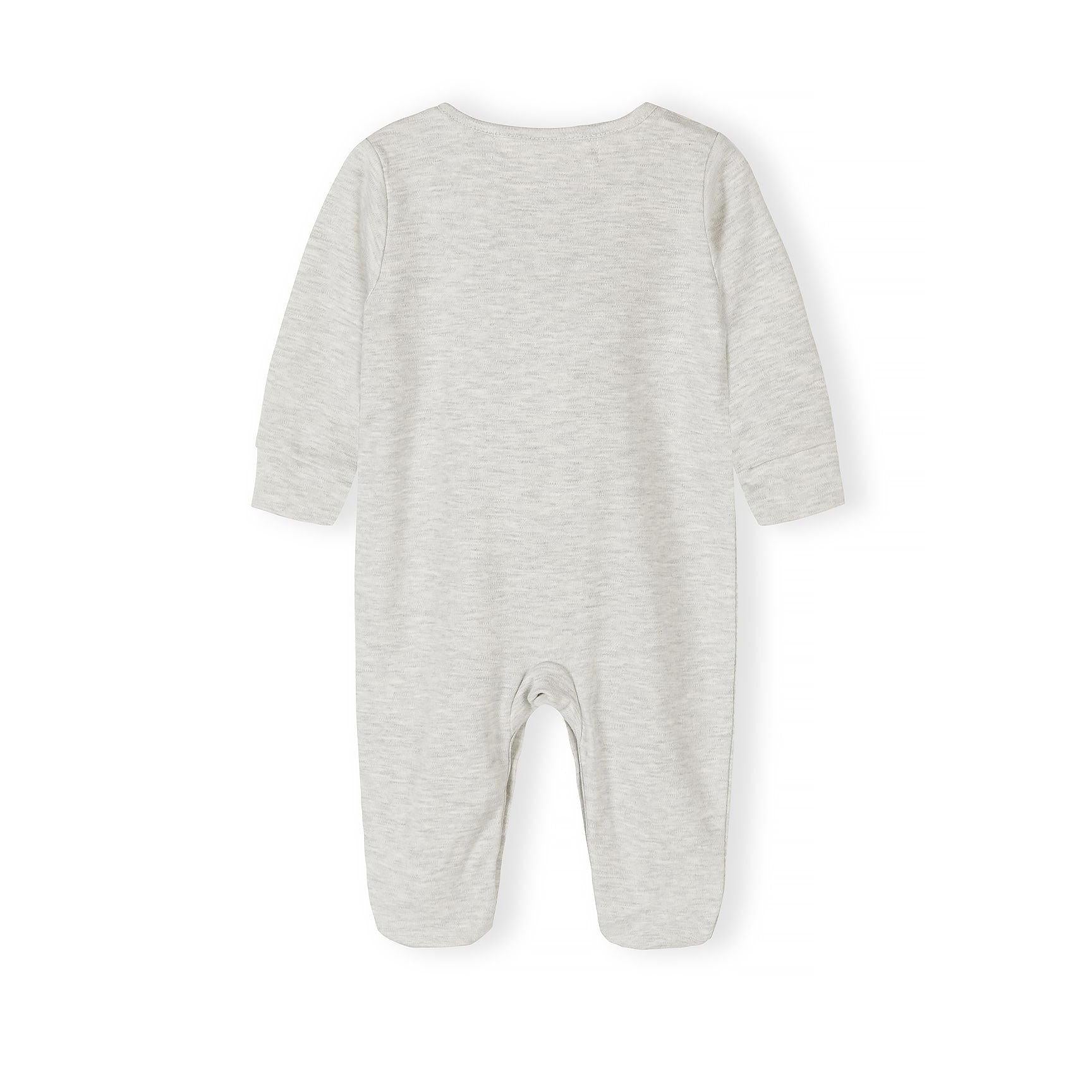 Close-up detail of light blue sleepsuit showing Minoti label, snap button closure and ribbed collar construction