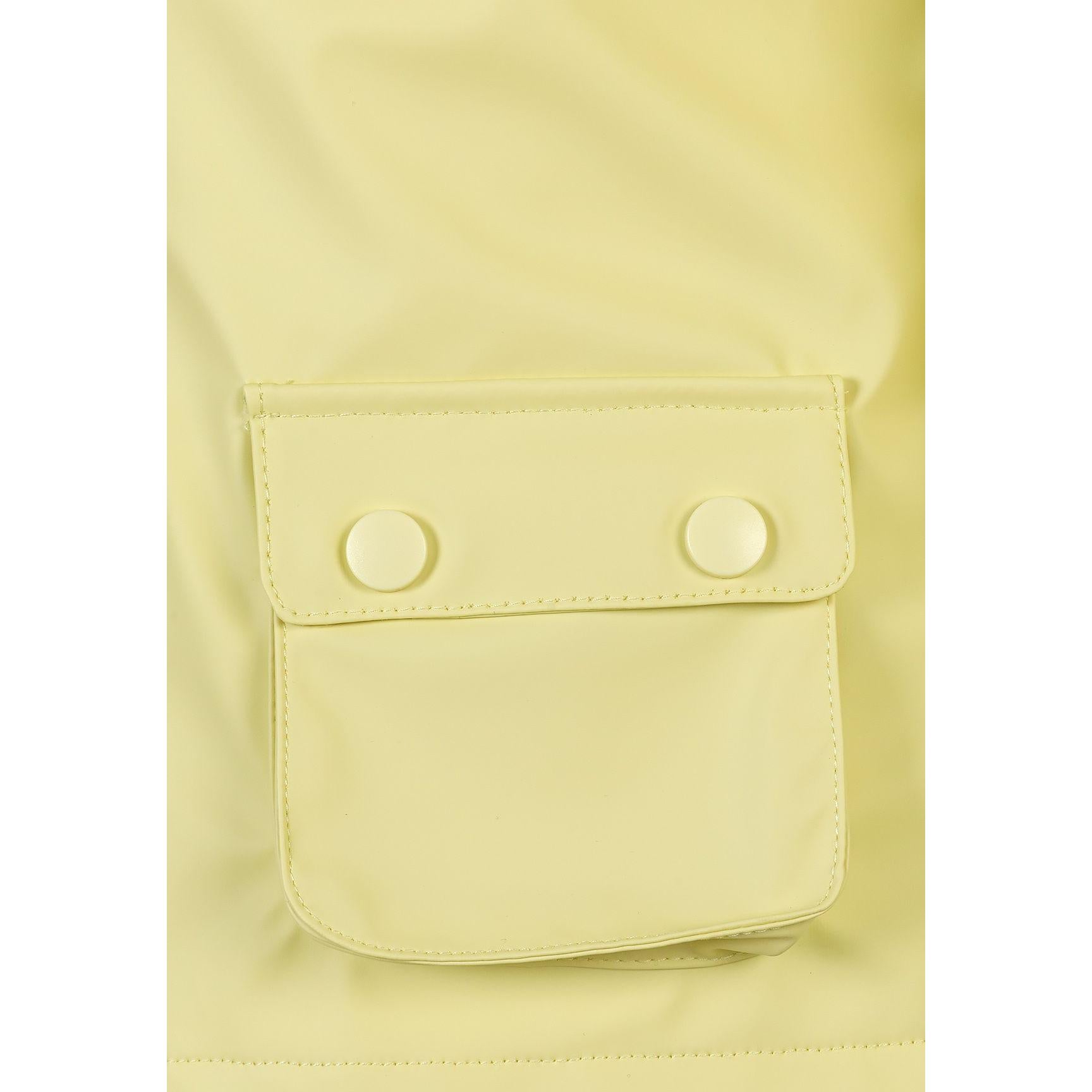 Close-up detail of yellow rain jacket front pocket with two snap button closures and stitched edges