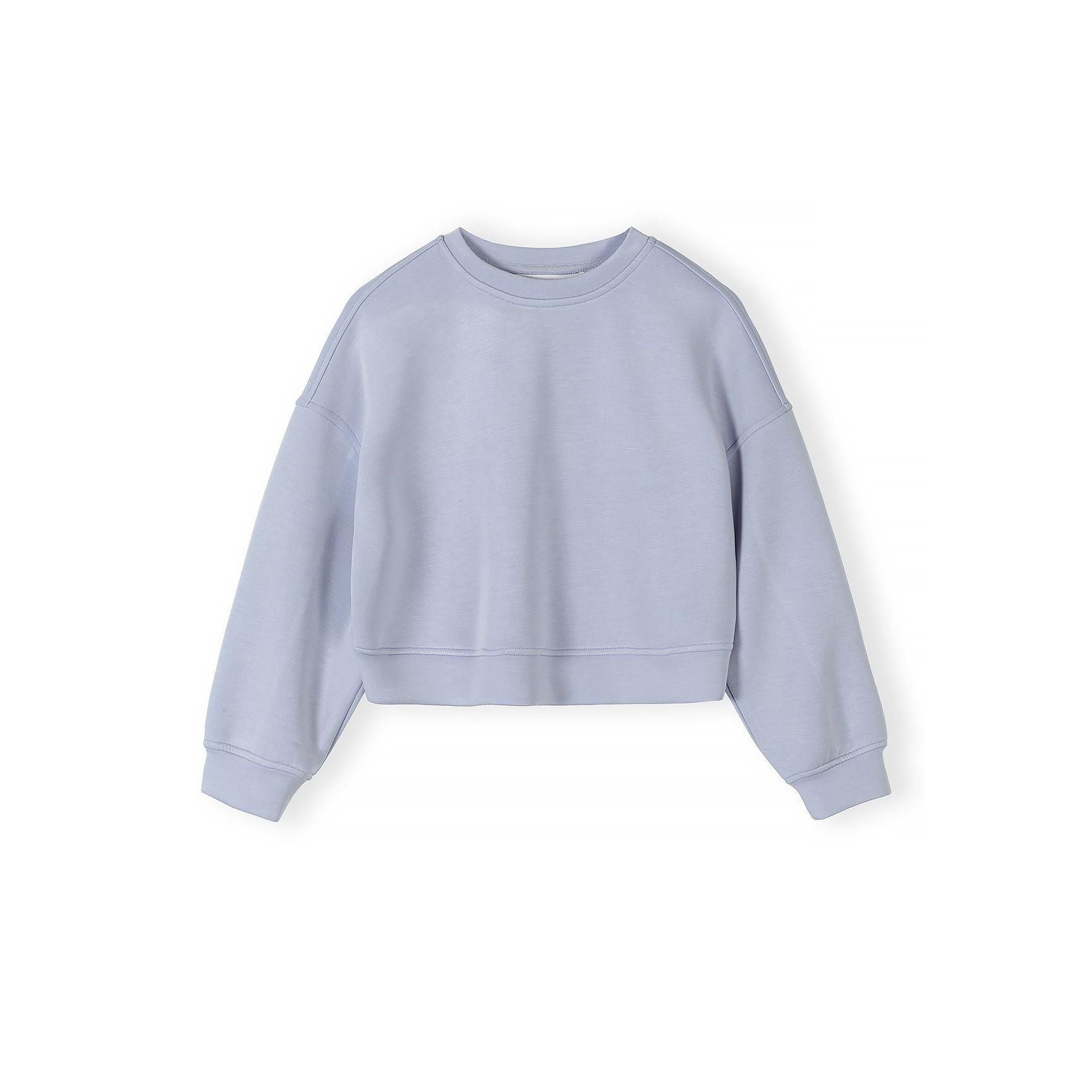 Close-up detail of lavender shorts showing elasticated waistband with drawstring ties