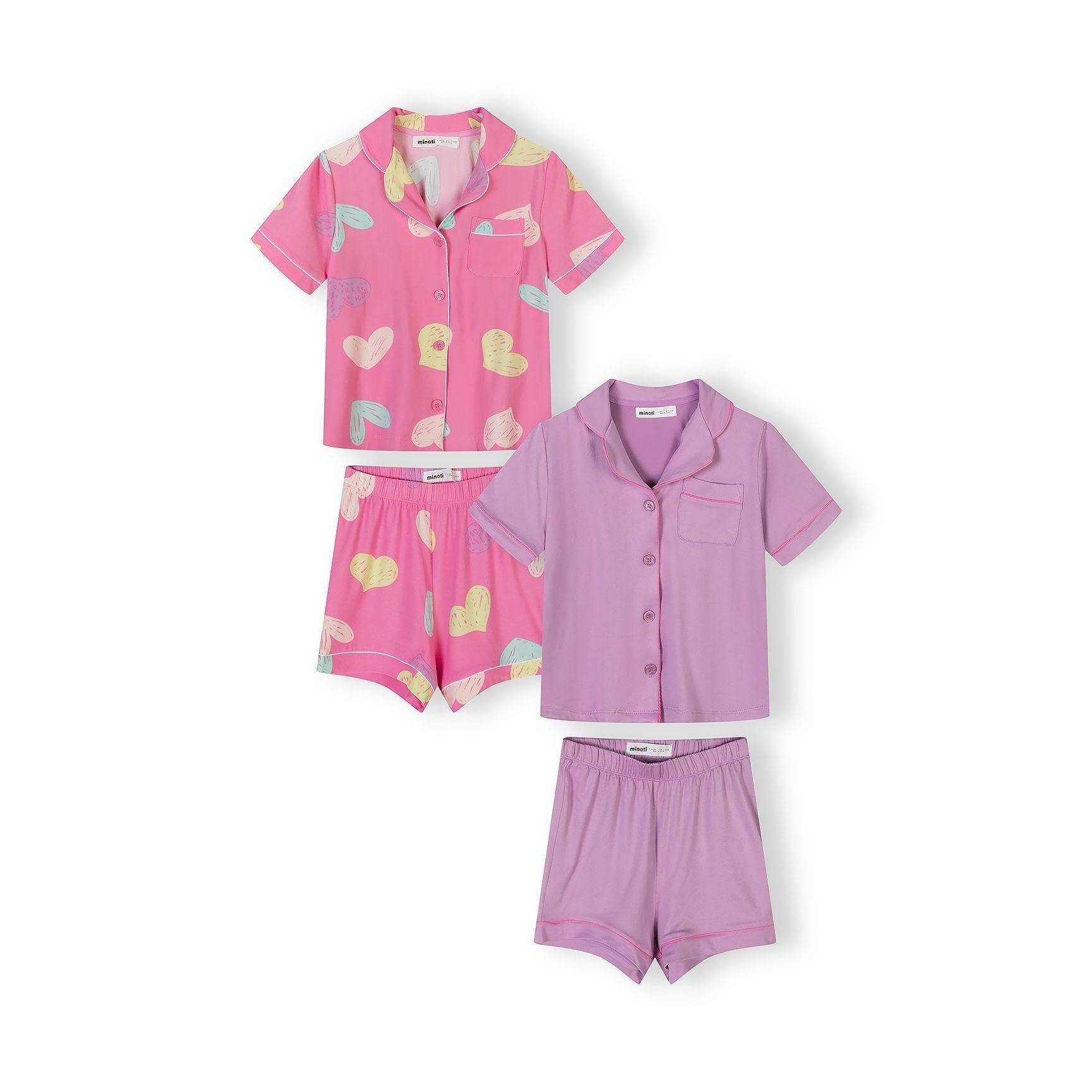 Purple cotton pajama set laid flat showing short sleeve button-up top and matching shorts against white background